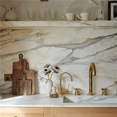 Taulells de marbre Calacatta Oro